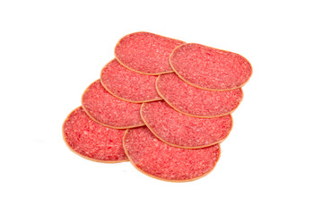Tasty salami slices background.
