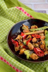 Oseng Kerang Saus Tiram, Indonesian food. Stir-fried mussels with oyster sauce, soy sauce, lemongrass, bayleaf, ginger, garlic and chili.