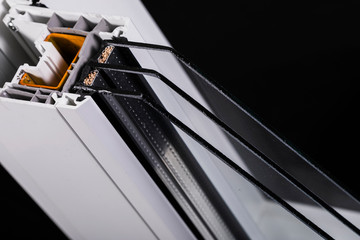 Plastic window profile with triple glazing