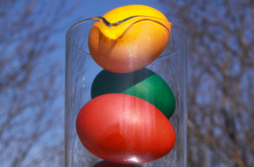 Easter eggs in glass vase or carafe concept idea