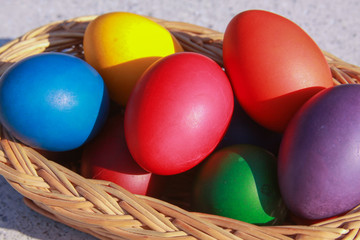 Fototapeta na wymiar Easter eggs colors in basket