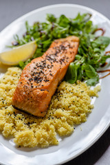 baked salmon with spinach salad and couscous