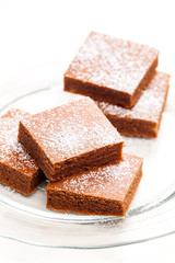 gingerbread  cubes with sugar on the plate