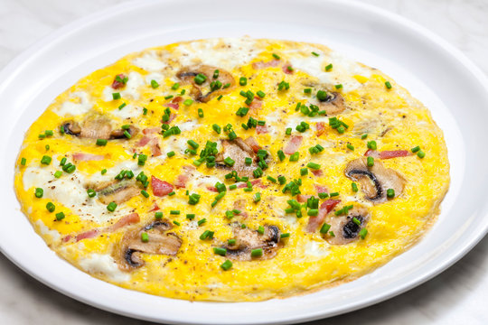 egg omelette with mushrooms and bacon