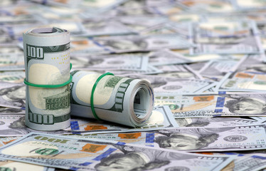 Hundred dollar bills rolled