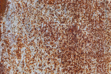 Rusty metal plate. Grunge metallic texture background with scratches and cracks.