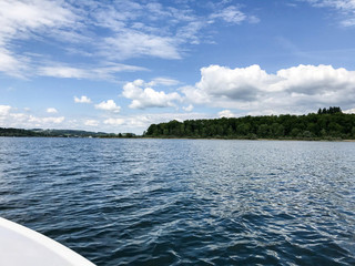 View from a boat in Chiemsee lake to the islands