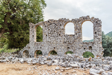 Ruins on mountains Likya Yolu way in Turkey, autumn hiking