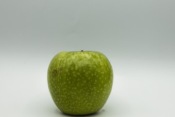 Green apple with a white background