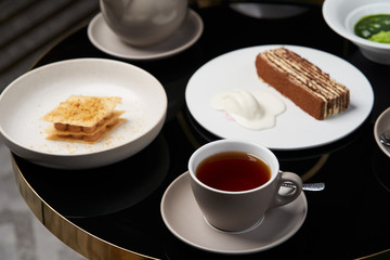 Traditional tea ceremony. Sweets dessert cookies cake and teapot