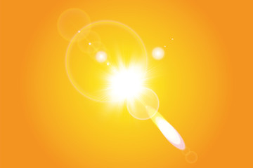 Warm sun on a yellow background. Summer. Glare. Solar rays.