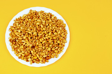 Wheat grain with honey, top view, text space