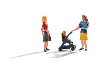 Woman with twin babies stopping to chat