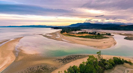 Ultra wide HDR Panorama of River estuary with mountains in the background