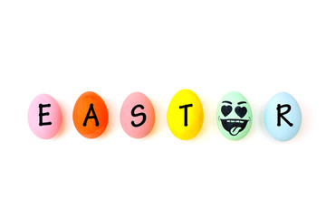 Perfect colorful handmade easter eggs with the letter EASTER isolated on a white background. Easter day concepts. Funny decoration. Happy Easter.