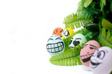 Perfect colorful handmade easter eggs with green plant isolated on white background. Easter day concepts. Funny decoration. Happy Easter. Copy space for text.