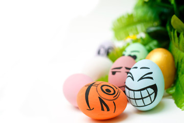 Perfect colorful handmade easter eggs with green plant isolated on white background. Easter day concepts. Funny decoration. Happy Easter. Copy space for text.