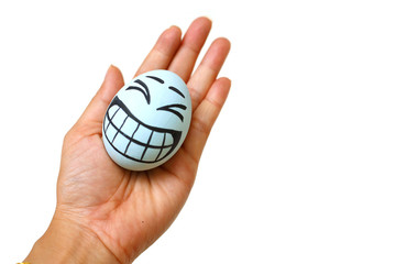 Perfect colorful handmade easter eggs with smile eggs in human hand isolated on a white background. Easter day concepts. Funny decoration. Happy Easter.