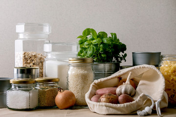 Food supplies crisis food stock for quarantine isolation period. Different glass jars with grains,...