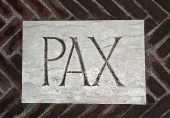 PAX TEXT which means Peace in Latin language engraved on the til