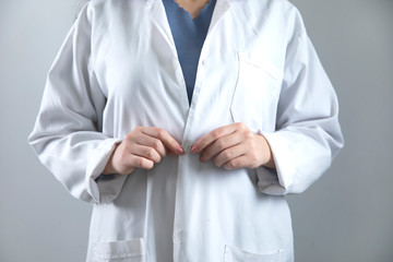 doctor woman hand button