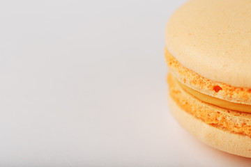 Yellow macaroni Cookies on a white background, isolated.
