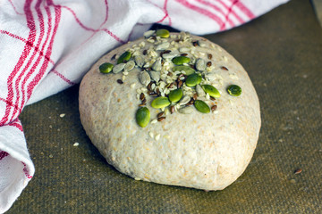 Yeast-free bread dough formed into baking loaves on a baking sheet