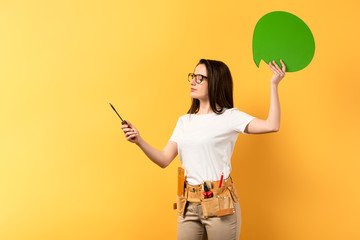 repairwoman holding thought bubble and screwdriver on yellow background