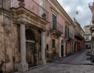 Fototapeta na wymiar Modica cityscape. View to Historical Buildings. Sicily, Italy.
