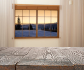 Empty wooden table and window with beautiful view indoors