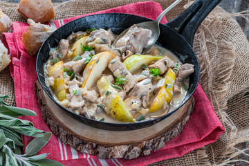 Creamy pork and pear cassoulet with cider