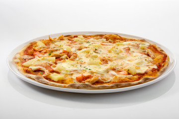 Flatlay of Italian pizza on wooden background. Rustic homemade pizzas with salami, bacon,  cheese, eggs and raw vegetables on shabby wooden background. Healthy vegetarian fungi pizza