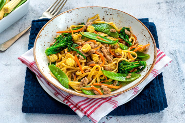 Pork noodle stir-fry with vegetables