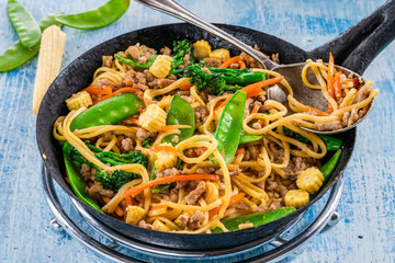 Pork noodle stir-fry with vegetables
