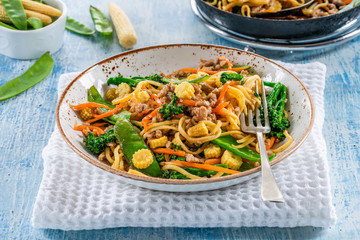 Pork noodle stir-fry with vegetables