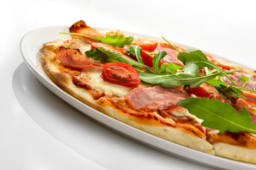Flatlay of Italian pizza on wooden background. Rustic homemade pizzas with salami, bacon,  cheese, eggs and raw vegetables on shabby wooden background. Healthy vegetarian fungi pizza