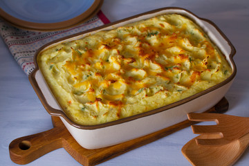 Creamy fish pie: salmon, cod, smoked coley, creamy sauce and cheesy potato topping