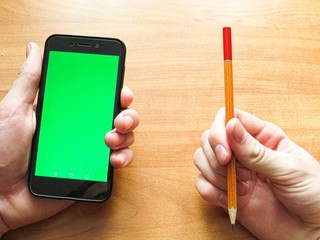 hands holding smart phone with blank screen isolated on white