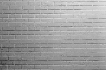 Fototapeta na wymiar brick wall background gray toned 