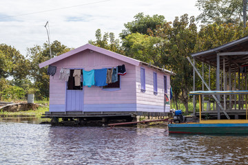 floating house in the amazon river