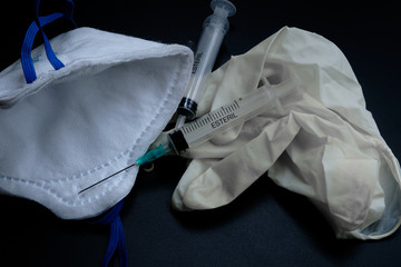 A small syringe into which a hollow, sharp-pointed bevel-cut needle is inserted and is used to inject medicinal substances into tissues or organs.