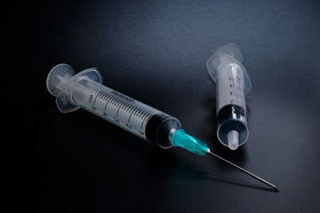 A small syringe into which a hollow, sharp-pointed bevel-cut needle is inserted and is used to...