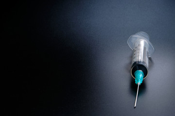 A small syringe into which a hollow, sharp-pointed bevel-cut needle is inserted and is used to...