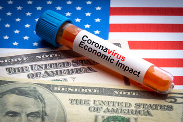 CORONAVIRUS ECONOMIC IMPACT text, US Dollar and blood sample vacuum tube on America flags...