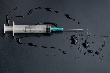 A small syringe into which a hollow, sharp-pointed bevel-cut needle is inserted and is used to...