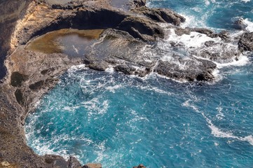 Waves wash over the rocky shores of Djeu in Cabo Verde