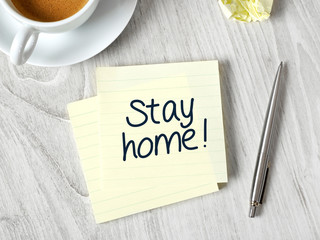 Stay home message on post-it