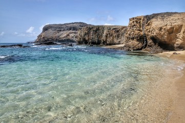 Clear water by the cliff in Djeu, an islet on the archipelago of Cabo Verde
