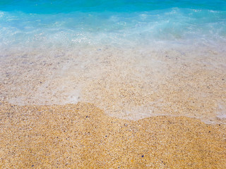 Fototapeta na wymiar yellow sand on the coast of Alanya in Turkey. Cleopatra beach
