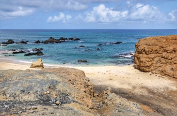 Fototapeta na wymiar Rocky white sand beach in Djeu, Cabo Verde
